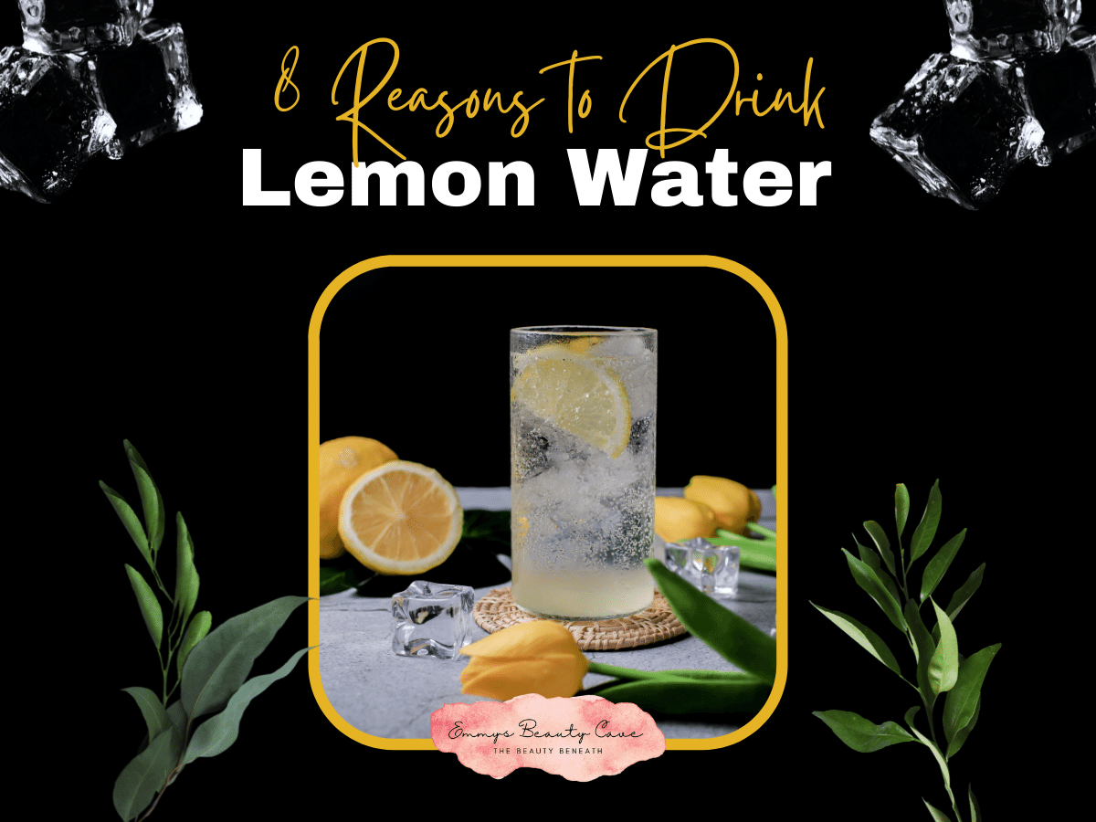 a glass of lemon water with ice and lemons
